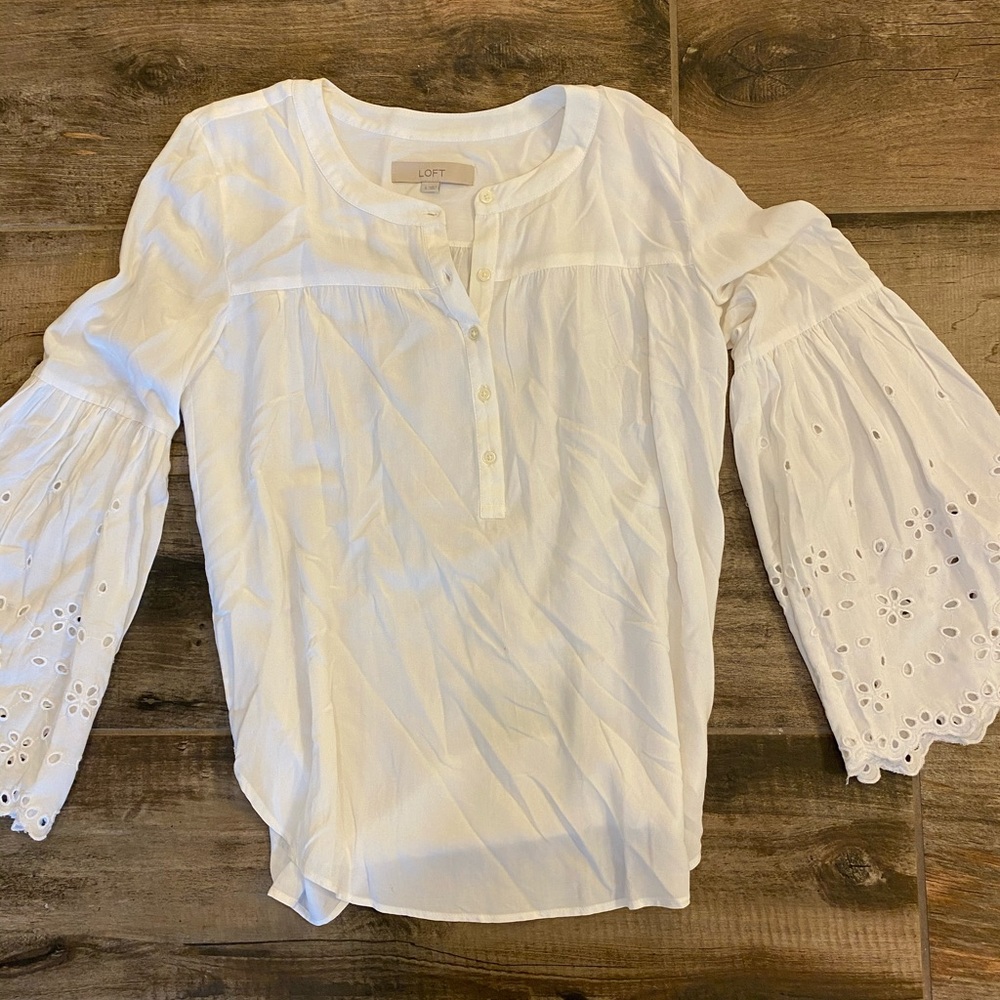 Bell sleeve blouse.